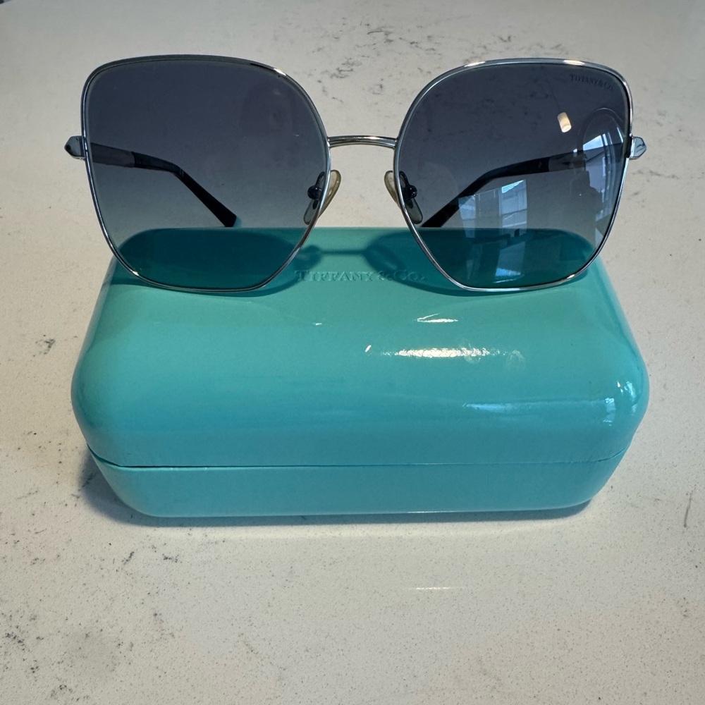 Tiffany & Co. Silver Frame Sunglasses. Barely worn and scratch free.